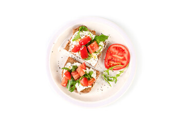 Sandwiches with soft cheese and herbs and tomatoes