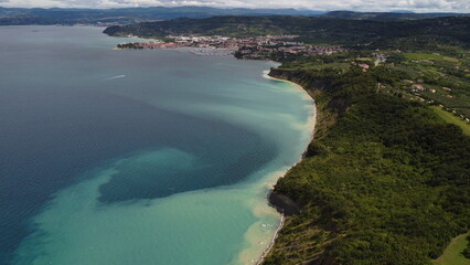 view of a wild beach from a dron above the cliffs