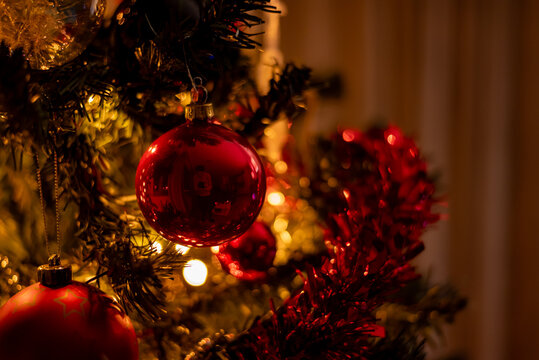 red christmas ball on christmas tree