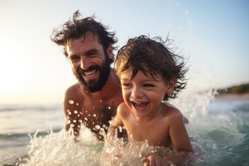 pleasure summertime family happy together dad with son playing splash water ocean - obrazy, fototapety, plakaty