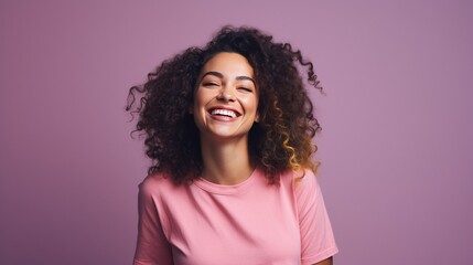 A beautiful woman wearing casual clothing, radiating joy with a bright smile in a studio setting, ideal for banners and advertisements - obrazy, fototapety, plakaty