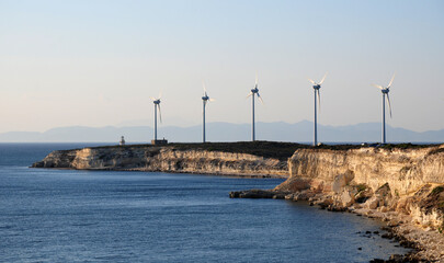 Fototapeta na wymiar Wind Turbine view from Bozcaada, a holiday town in Turkey