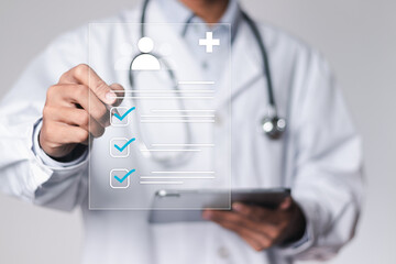 Medicine doctor use tablet to review patient medical records on virtual screens for digital healthcare. Review medical reports carefully and diagnose illnesses for an effective treatment plan.