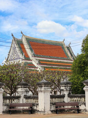 Naklejka premium A buddhist temple and two chairs in Thailand