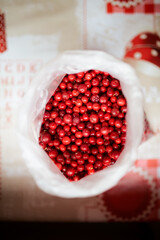 Lingonberries aka cowberries in a plastic bag on a table