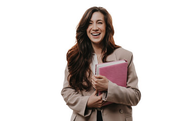 Naklejka premium Cheerful woman in beige jacket holds bool looks at camera toothy smiles against transparent background. Attractive businesswoman laughs happily at office. Successful people. Satisfied female.