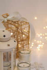 Christmas decoration with candles and snowflakes on a white background.