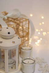 Christmas decoration with candles and snowflakes on a white background.