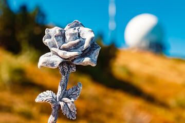 Details of a stone rose with a radar antenna dome at Mount Arber, King of the Bavarian Forest, Top...