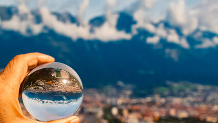 Crystal ball alpine landscape shot with the famous Nordkette mountains near Innsbruck, Tyrol,...
