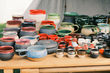 ancient viking pottery replicas, in a tent, at a medieval viking reenactment camp festival