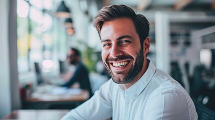 Happy smiling businessman in office