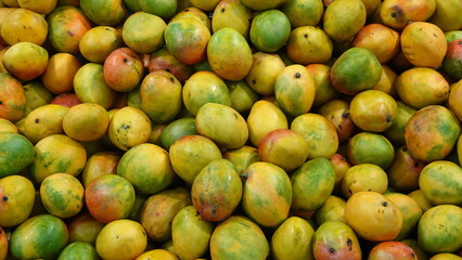 Mango Background. Ripe Fruit Backdrop. Tropical Delicious healthy Snack. Wallpaper or Backdrop
