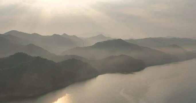 green mountains and river in mist