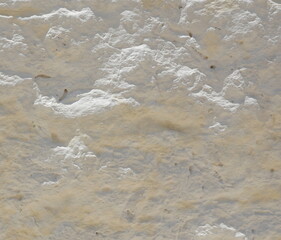 Texture of natural white stone. Chalk cliff of salt stone. Close up. Outdoor. Indoor. Weathered surface. Square size