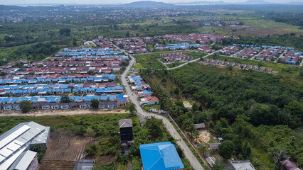 Aerial view of subsidized housing (KPR) on a wide and green land