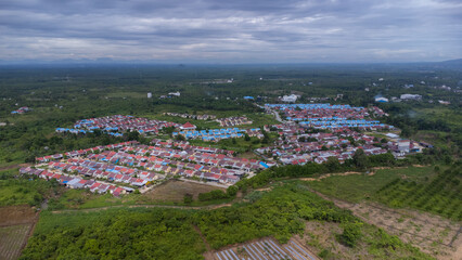 Fototapeta na wymiar Aerial view of subsidized housing (KPR) on a wide and green land