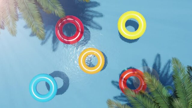 Summer image of swim tubes floating in the ocean.