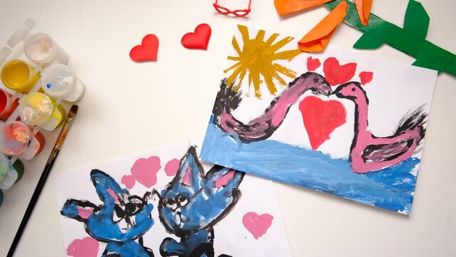 Child drawing hearts, pets, cats family, funny sketch for birthday, Mothers day or Valentines day. Education. Inspiration and imagination
