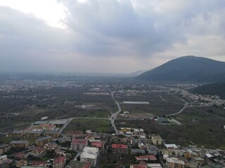 A panoramic view of a small town, nestled in the mountains, in southern Italy