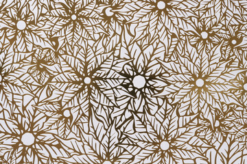 decorative holiday scrapbooking sheet background featuring embossed gold foil poinsettia flowers on white