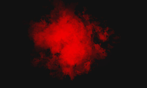 abstract red powder explosion on black background. Red smoke on black. Colorful smoke close-up on a black background. Red cloud of smoke. Red Heart. abstract colored dust explosion