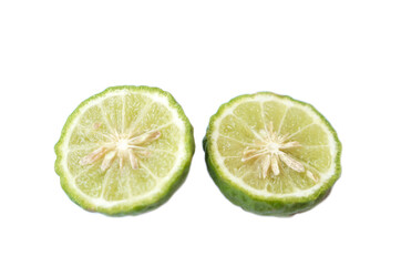 Half slice of bergamot fruit or Kaffir lime isolated on white background. Concept, herbal fruits with sour taste, can be cooked as food seasoning and use for spa , aroma. Medicinal herb.