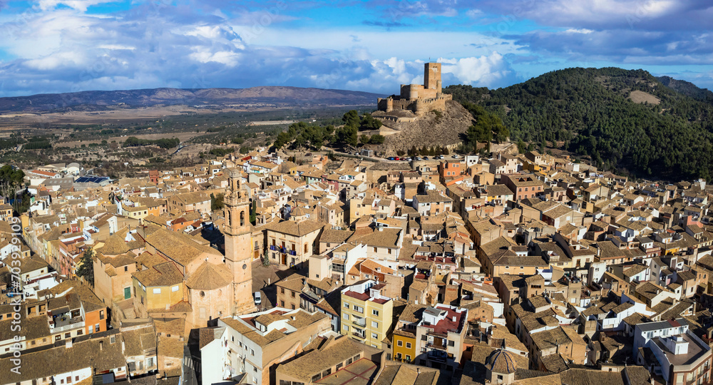 Poster medieval Town Biar in Spain and castle. Sierra de Mariola in the Vinalopo Valley in the province of Alicante . aerial drone panoramic view