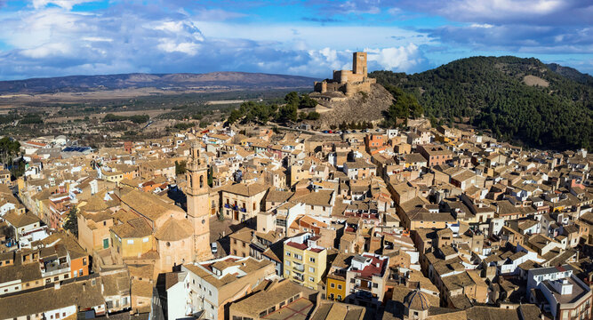 medieval Town Biar in Spain and castle. Sierra de Mariola in the Vinalopo Valley in the province of Alicante . aerial drone panoramic view