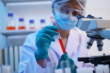 Science test tubes, laboratory equipment for new medical research, microbiology research with small...