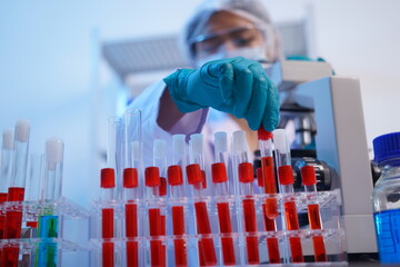 Science test tubes, laboratory equipment for new medical research, microbiology research with small...
