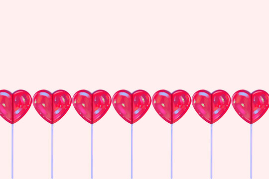 Lollipop hearts on pastel pink background with copy space. Valentine's day greeting card or wallpaper.