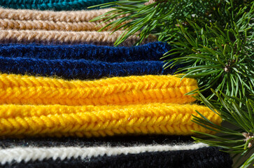 Crochet. Samples of patterns from blue, black, beige and yellow yarn.