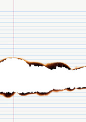 Notebook paper burned. Lined notebook paper