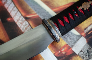 Red and black colure with tanto knife handle wraping