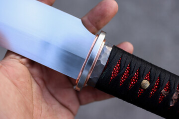 Red and black colure with tanto knife handle wraping
