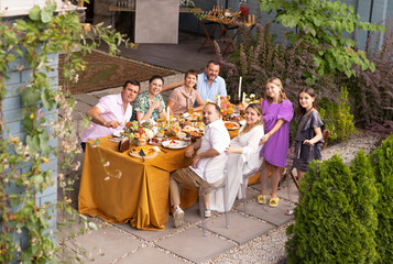 Many people saying cheers and showing their champagne glasses. Wedding party