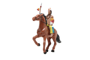 Native american , vintage toy warrior on horseback with spear and shield, on transparent...