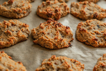delicious fresh out of the oven baked keto almond flour cookies lined on parchment paper