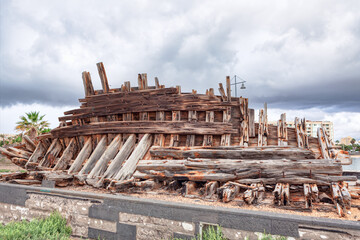 Abandoned wooden ship wreck in the port of Lanzarote
