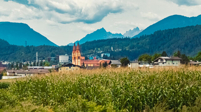 Alpine summer view with a church near Telfs, Innsbruck, Tyrol, Austria