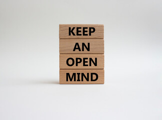 Keep an open mind symbol. Wooden blocks with words Keep an open mind. Beautiful white background. Business and Keep an open mind concept. Copy space.