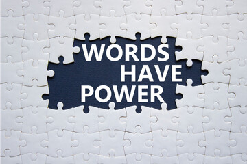 Words have power symbol. Concept words Words have power on white puzzle. Beautiful deep blue...