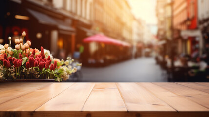 Naklejka na ściany i meble An empty wooden table top blurred flower market, copy space banner display of vibrant spring tulips and peonies