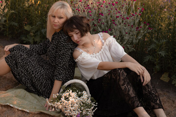 mother and daughter in the garden