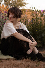 girl sitting on the ground