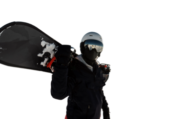 A male snowboarder in a winter suit and helmet holds a snowboard. Transparent background.l