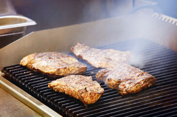 Steak meat grilled with smoke