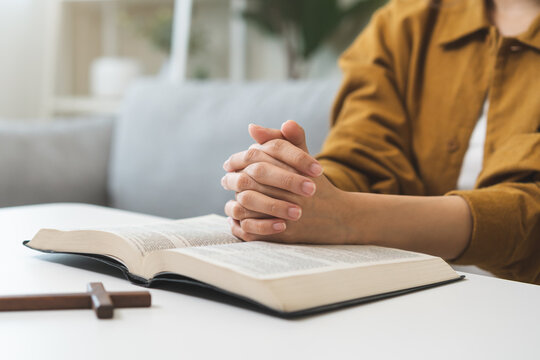 Religion and believe, faith christian woman holding holy bible book in hand, peace and hope of humble. Pray, prayer person meditating, praying to request God, jesus asking for help, spiritual concept.