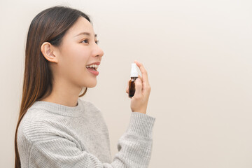 Health care treatment sore throat concept, sick pain asian young woman have cough symptom holding...